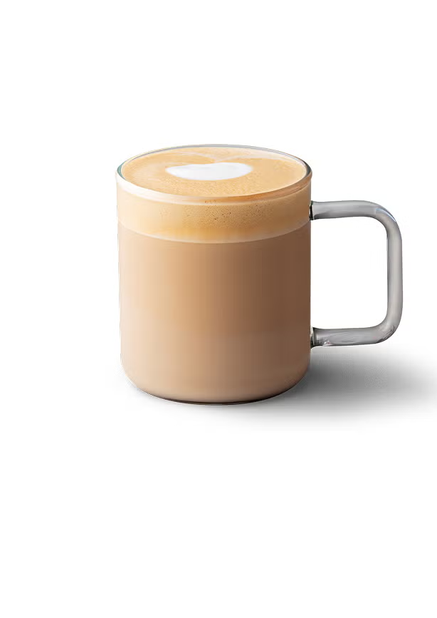En caffè latte i et glaskrus 