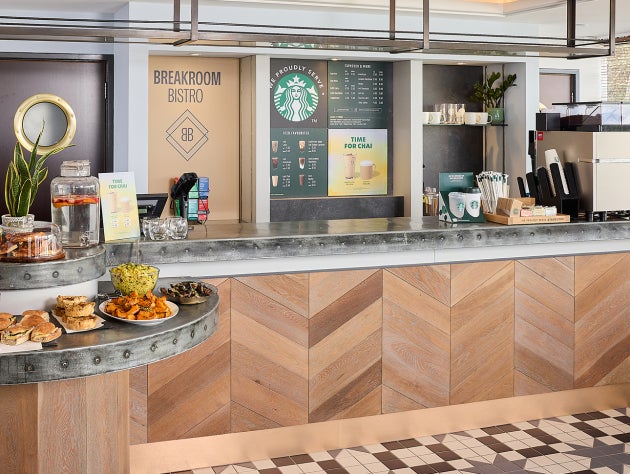 En We Proudly Serve Starbucks-serveringsdisk