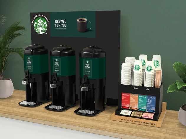 Løsningen med færdigbrygget kaffe i størrelsen Tall med en kaffestation med selvbetjening med tre store kaffedispensere og et